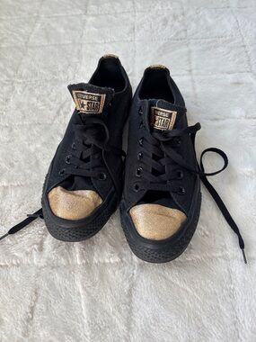 Converse Star Low Top Sneakers in Black with Gold Toecaps